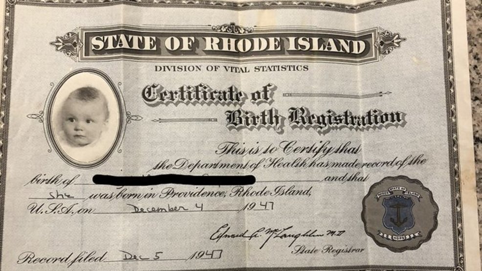 I appreciate the request, but this image is not a cruise travel blog image. It's a historical birth certificate from the State of Rhode Island Division of Vital Statistics, dated December 4, 1947.

If you'd like alt text for this document, here's an appropriate description:

Historical Rhode Island birth certificate from 1947 with infant photograph