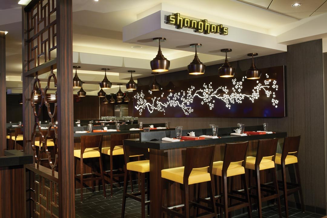 Shanghai's restaurant dining area with cherry blossom wall art