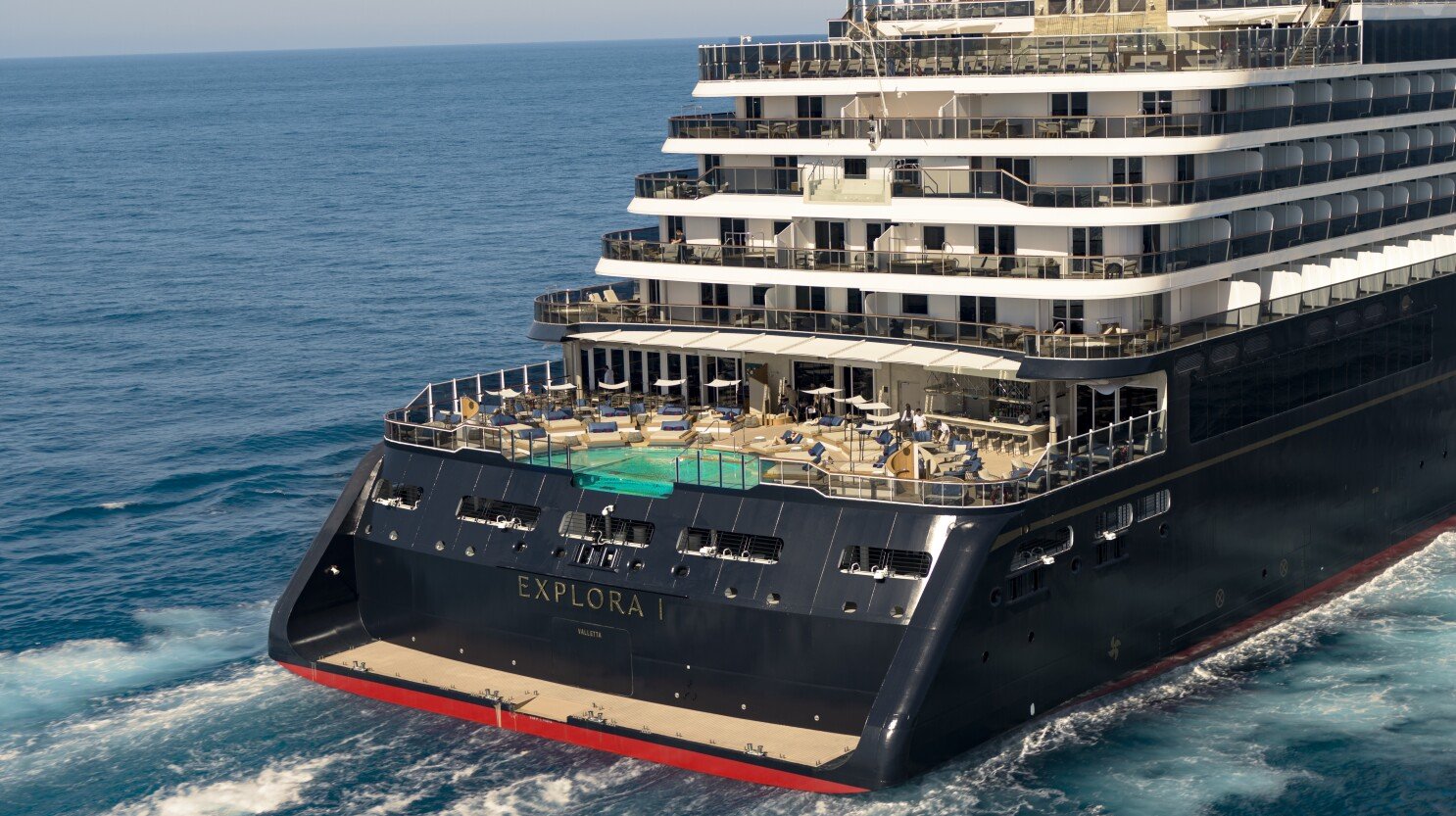 Explora I cruise ship beached with pool deck visible