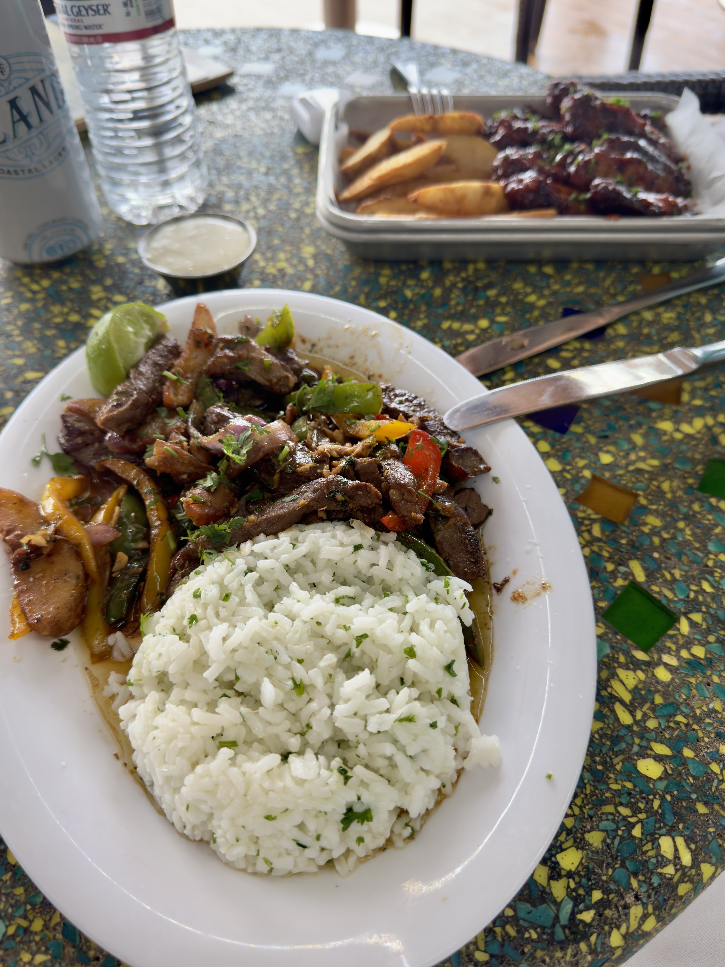 Beef steak with rice and vegetables served on cruise ship