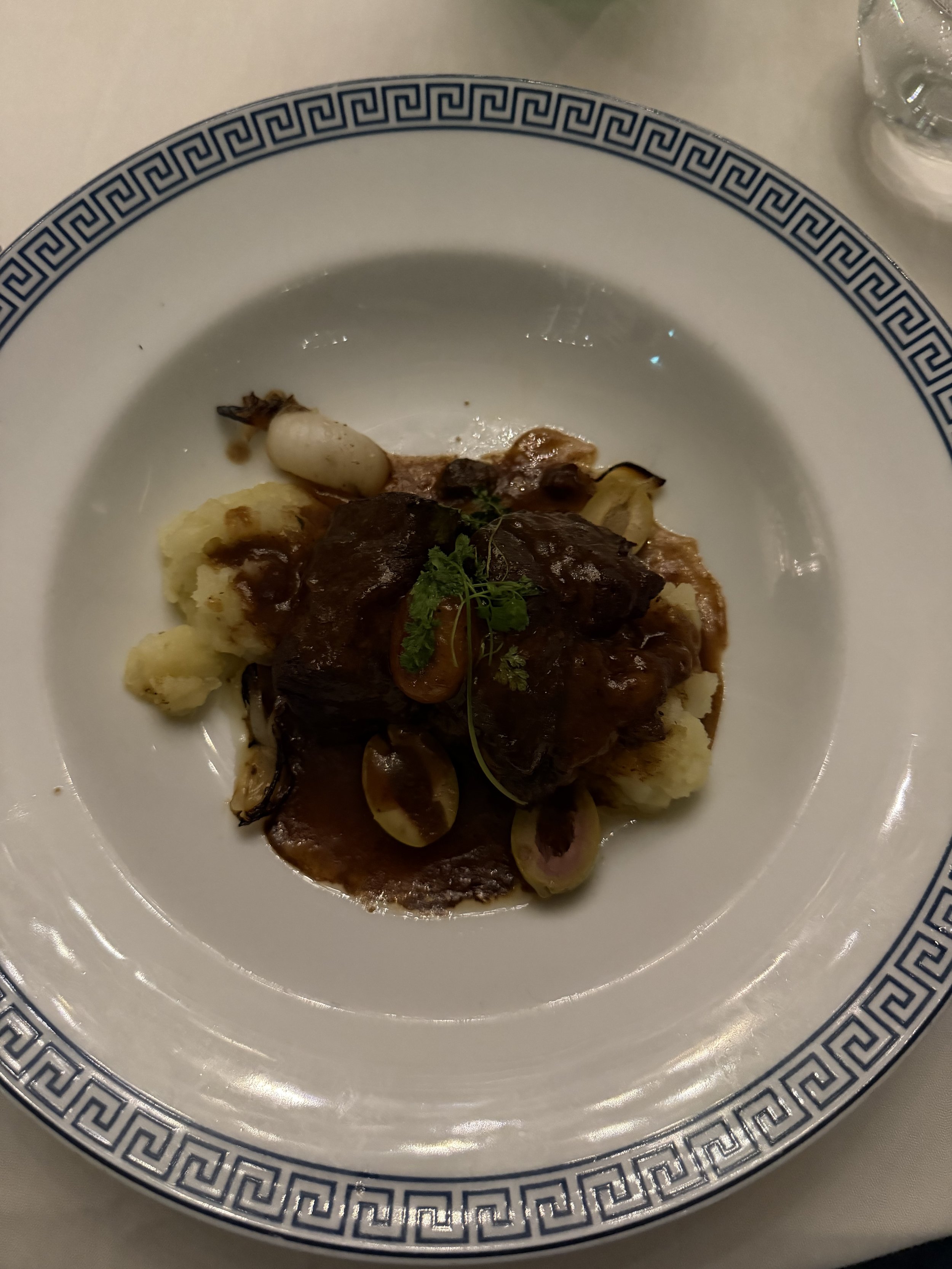 Gourmet braised meat with mashed potatoes and squid garnish
