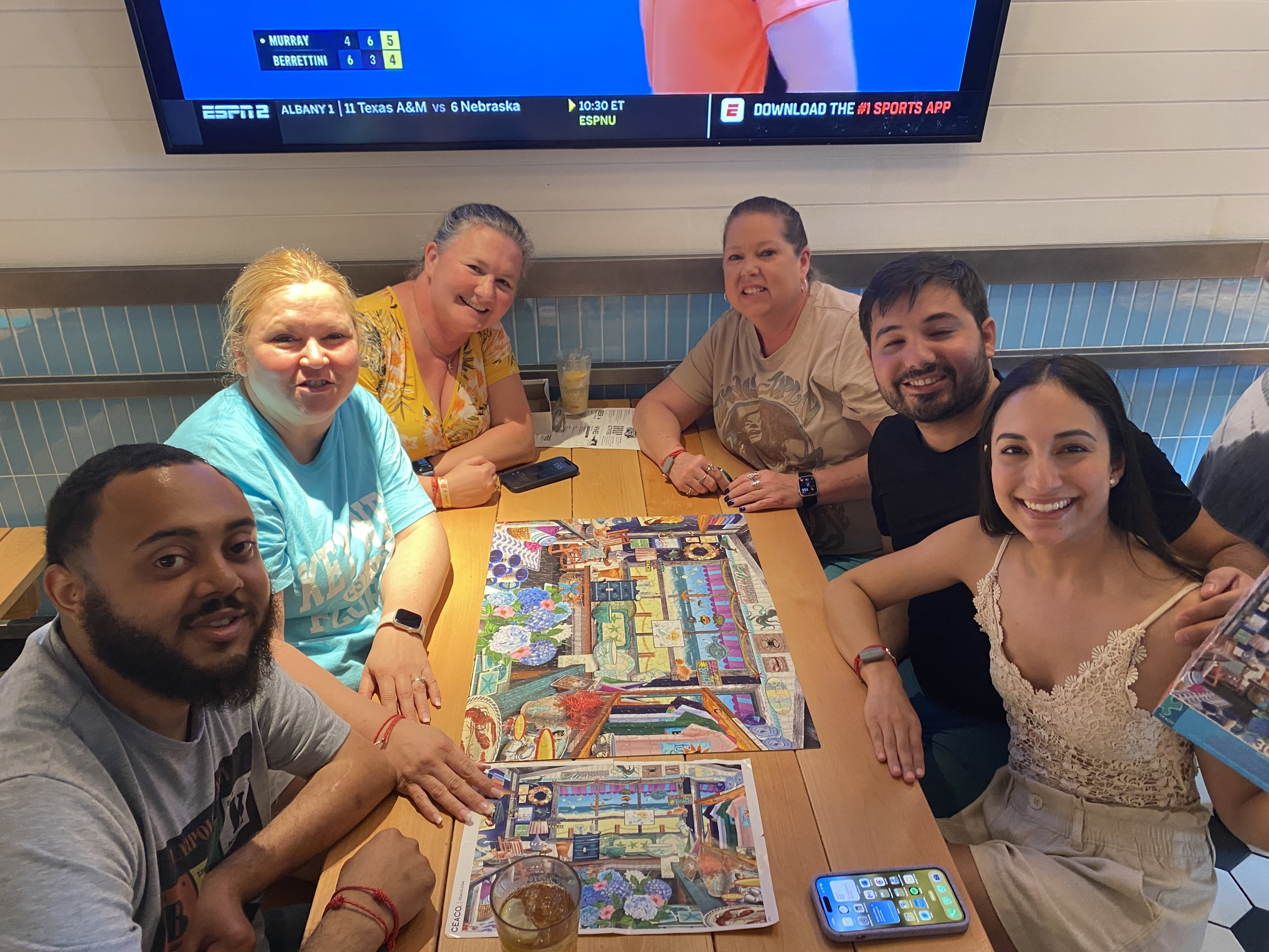 Group playing board game together on cruise ship