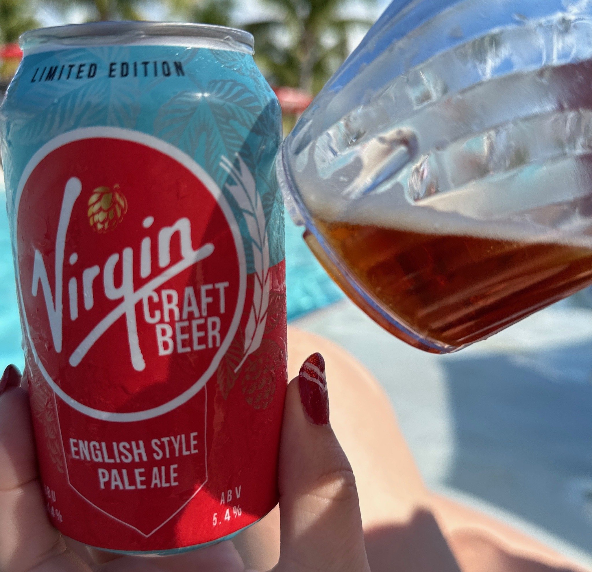 Virgin Craft Beer limited edition English style pale ale being poured outdoors