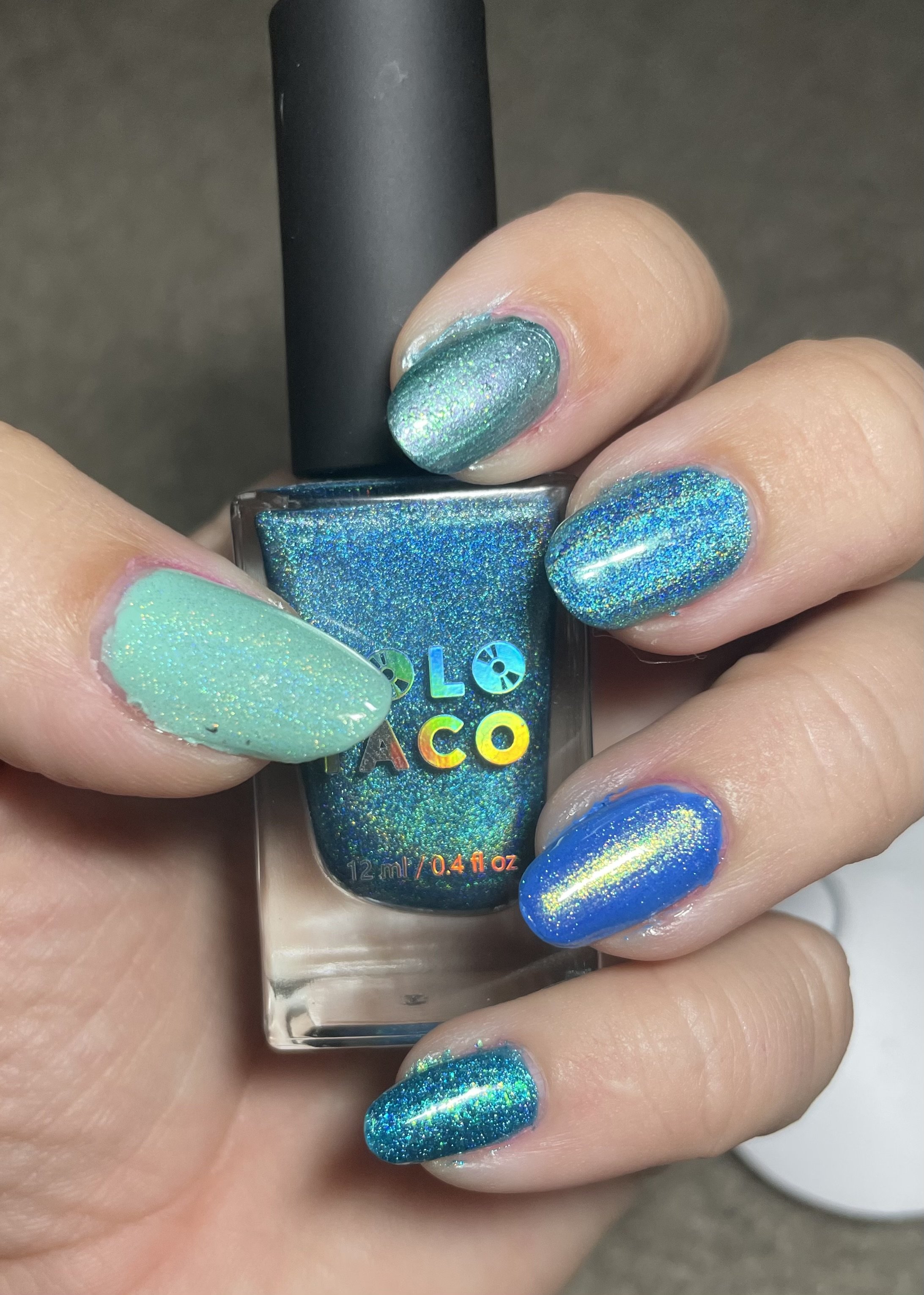 Colorful glitter nail polish swatches from LALO cosmetics brand