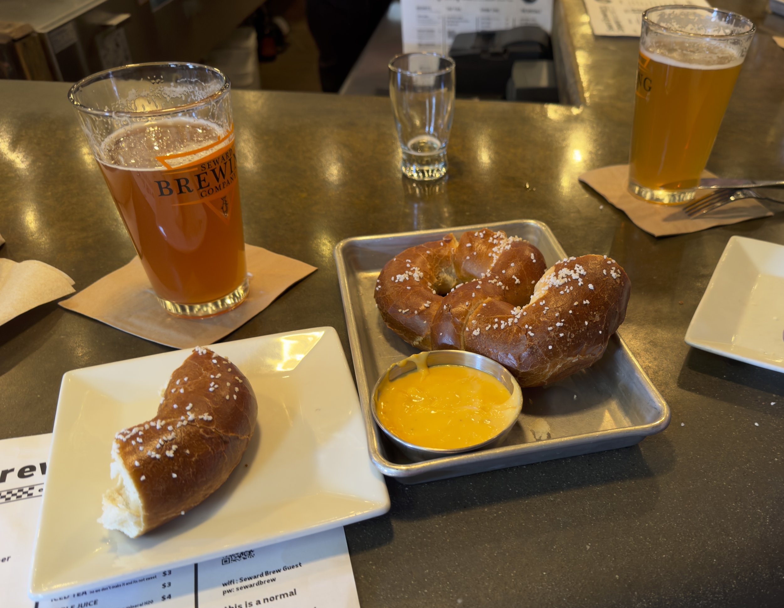 Seward Brewery beer and salted donuts with dipping sauce