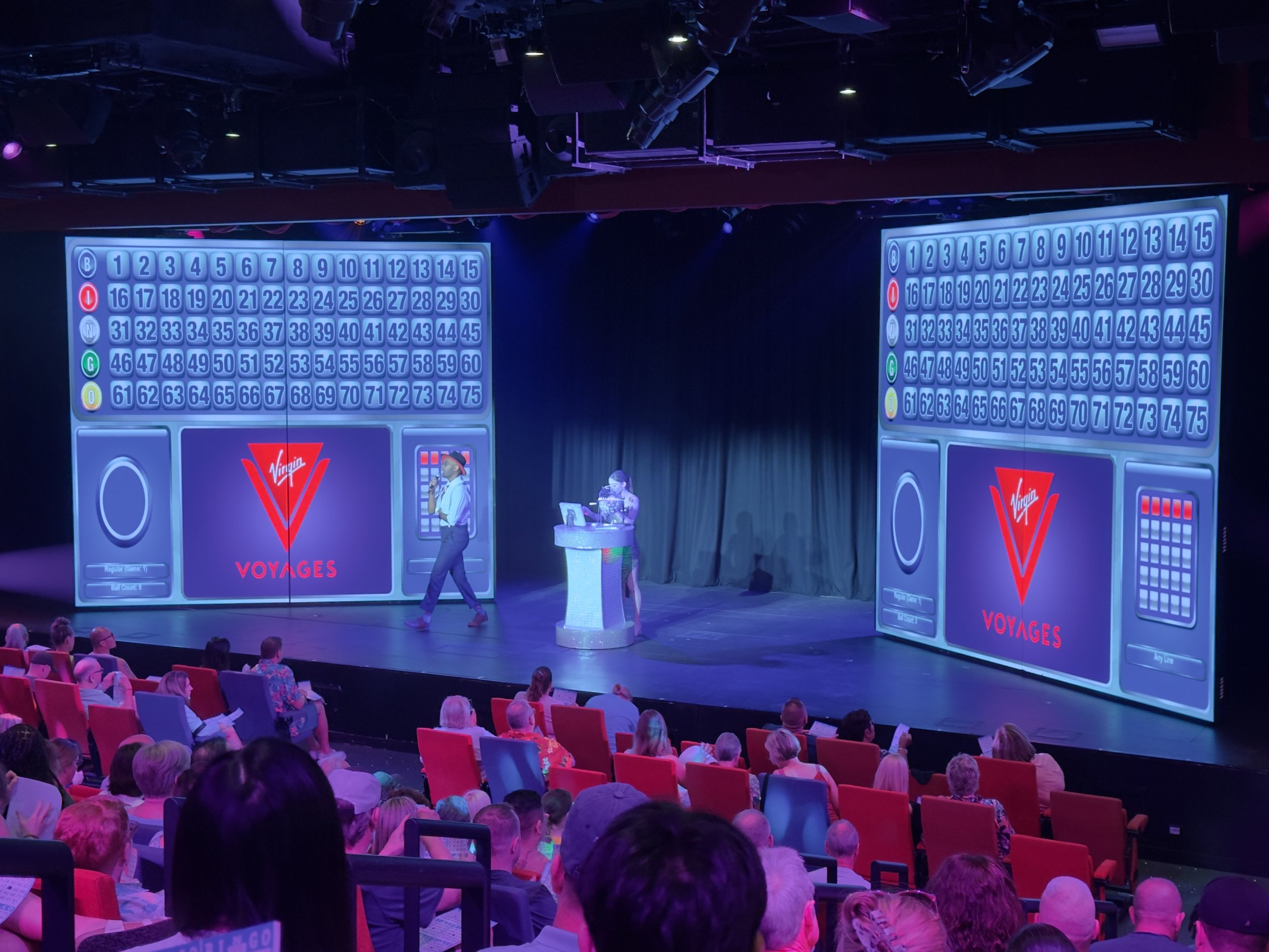 Virgin Voyages bingo game show on cruise ship stage