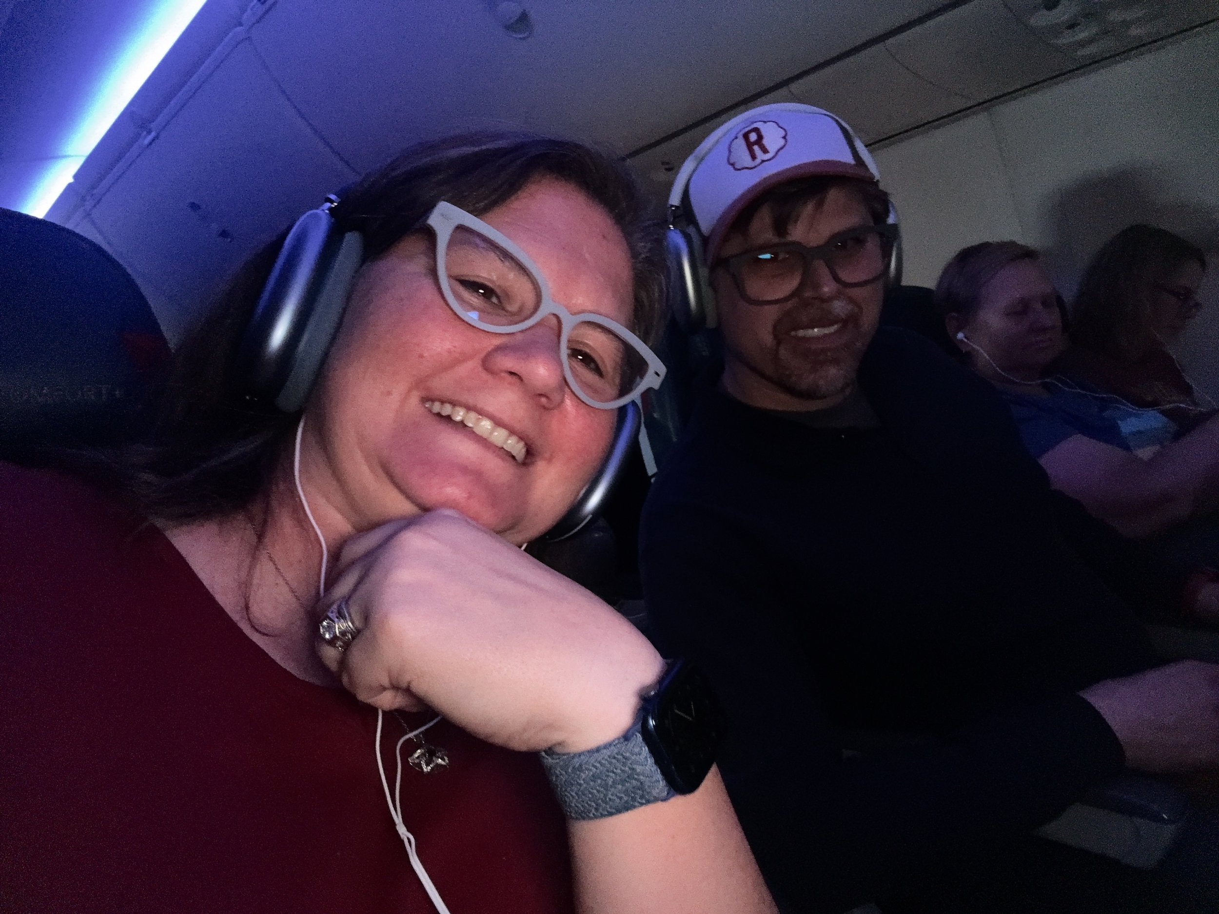Two passengers enjoying silent disco party on cruise ship